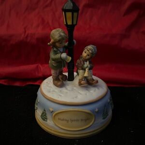 Goebel Figurine with Yellow and Blue Accents